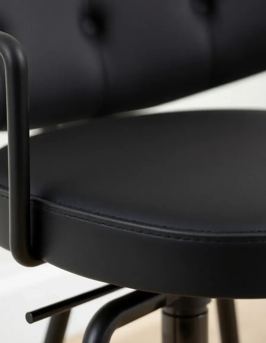 Swivel stool with back support and black cushion