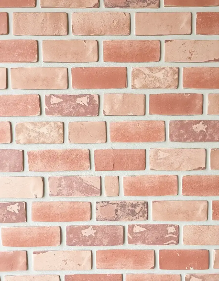 Faux brick wall tiles in red tones
