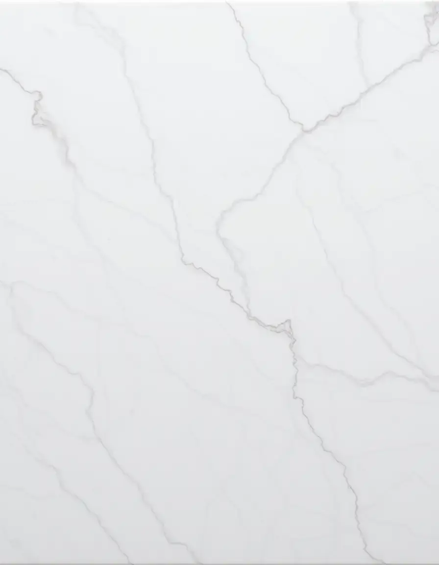 Veined white marble cutting board on a kitchen counter