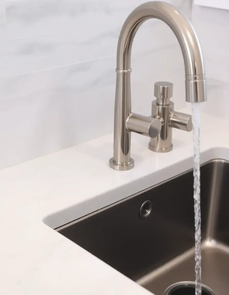 Brushed nickel kitchen faucet with side spray