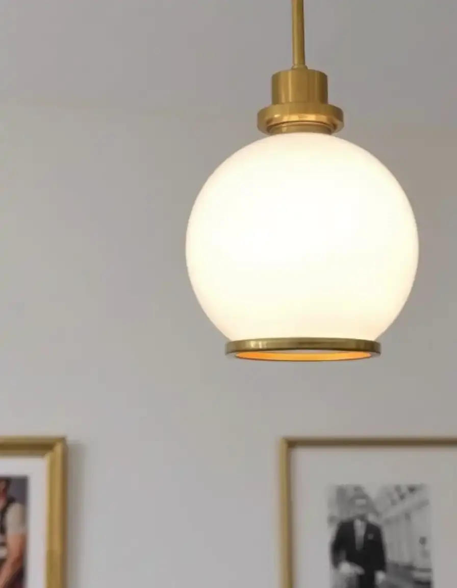 Globe Shade Pendant Lighting with gold accents